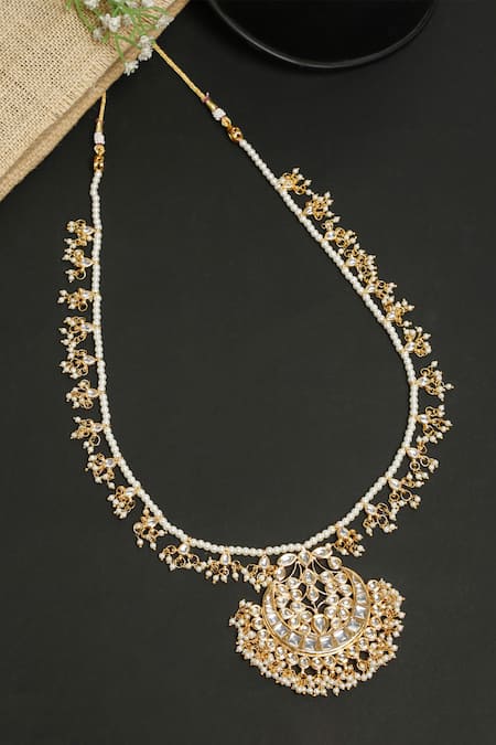 Shop Ruby Raang Gold Plated Kundan Embellished Long Pendant Necklace at Aza Fashions Shop_Ruby Raang_Gold Plated Kundan Embellished Long Pendant Necklace _at_Aza_Fashions