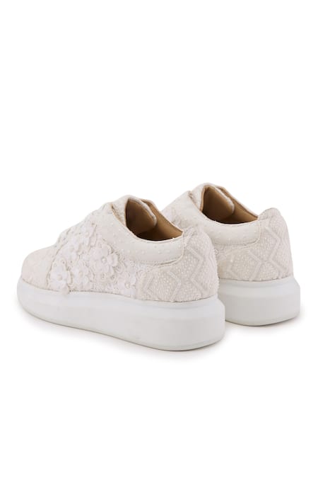 Shop Anaar White Daphne Crochet Flower Embroidered Flat Sneakers Online at Aza Fashions Shop_Anaar_White Daphne Crochet Flower Embroidered Flat Sneakers _Online_at_Aza_Fashions