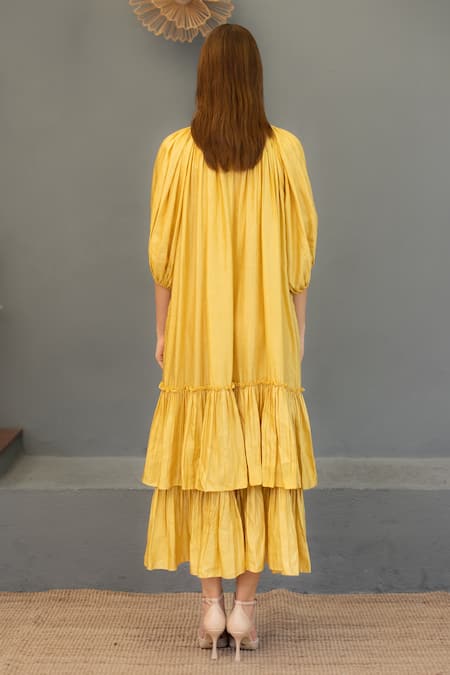 Shop Ozel Yellow Linen Satin Plain Round Ariana Tiered Gathered Midi Dress at Aza Fashions Shop_Ozel_Yellow Linen Satin Plain Round Ariana Tiered Gathered Midi Dress _at_Aza_Fashions