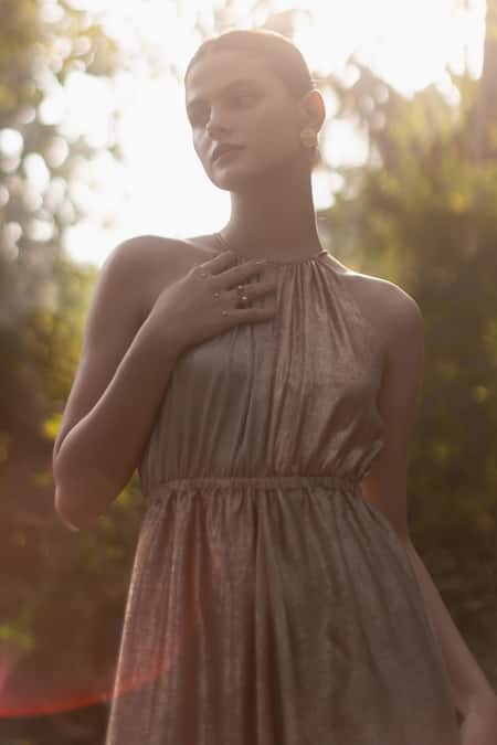 Ozel Gold Shimmer Crepe Halter Harper Dual Toned Dress at Aza Fashions Ozel_Gold Shimmer Crepe Halter Harper Dual Toned Dress _at_Aza_Fashions