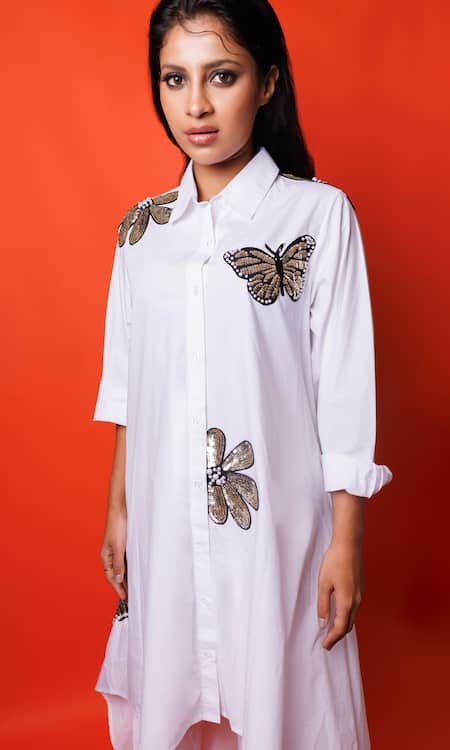 Shop Richaa Goenka White Cotton Sequins, Embroidery Collared Asymmetric Kurta With Pant Online at Aza Fashions Shop_Richaa Goenka_White Cotton Sequins, Embroidery Collared Asymmetric Kurta With Pant _Online_at_Aza_Fashions