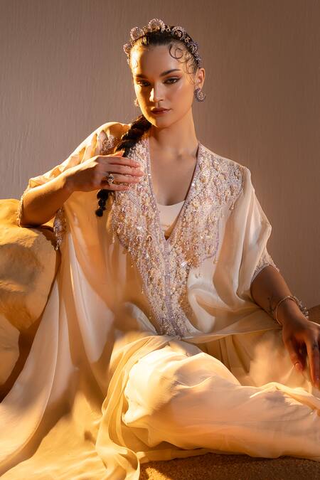 Buy Tyohar Ivory Crepe Embroidery Sequin V Neck Naima Pearl Glory Kaftan Pleated Pant Set Online at Aza Fashions Buy_Tyohar_Ivory Crepe Embroidery Sequin V Neck Naima Pearl Glory Kaftan Pleated Pant Set_Online_at_Aza_Fashions