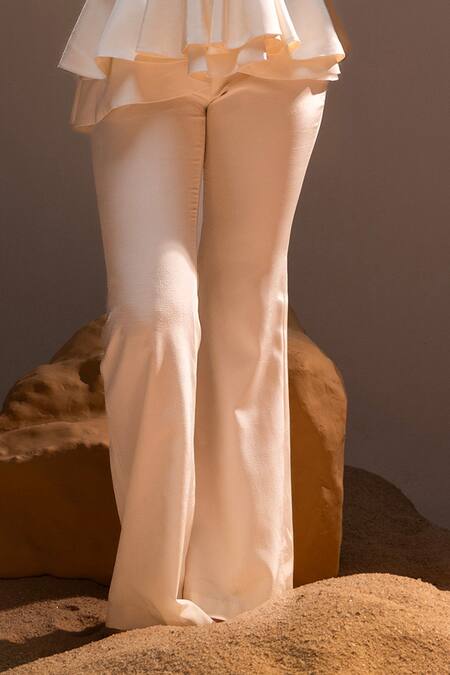 Tyohar Ivory Crepe Embroidery Sequin V Neck Mahra Pearl Peplum Top With Bootcut Pant Online at Aza Fashions Tyohar_Ivory Crepe Embroidery Sequin V Neck Mahra Pearl Peplum Top With Bootcut Pant_Online_at_Aza_Fashions