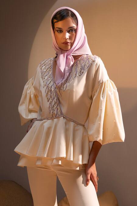 Shop Tyohar Ivory Crepe Embroidery Sequin V Neck Mahra Pearl Peplum Top With Bootcut Pant Online at Aza Fashions Shop_Tyohar_Ivory Crepe Embroidery Sequin V Neck Mahra Pearl Peplum Top With Bootcut Pant_Online_at_Aza_Fashions