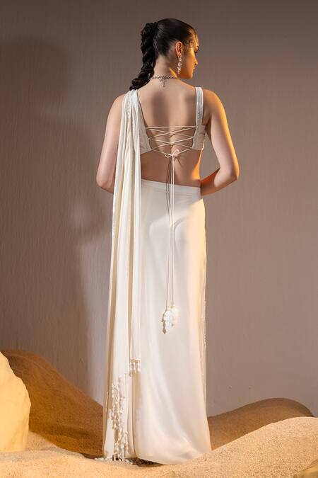 Shop Tyohar Ivory Crepe Sequins, Pearls, Cut Nour Phoenix Embroidered Pre-draped Saree Set at Aza Fashions Shop_Tyohar_Ivory Crepe Sequins, Pearls, Cut Nour Phoenix Embroidered Pre-draped Saree Set_at_Aza_Fashions