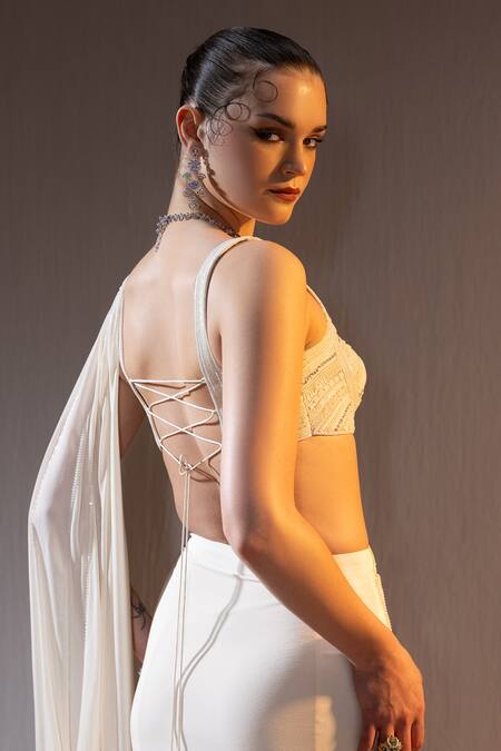 Shop Tyohar Ivory Crepe Sequins, Pearls, Cut Nour Phoenix Embroidered Pre-draped Saree Set Online at Aza Fashions Shop_Tyohar_Ivory Crepe Sequins, Pearls, Cut Nour Phoenix Embroidered Pre-draped Saree Set_Online_at_Aza_Fashions