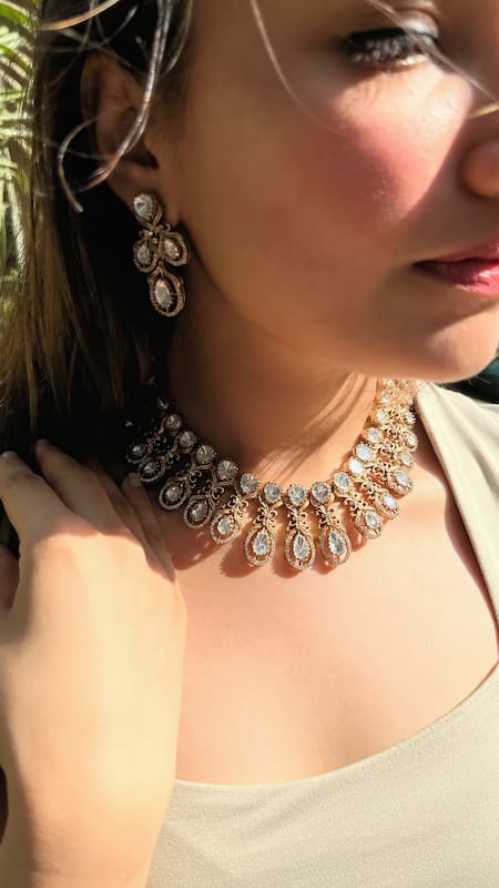 Shop Prestones Gold Plated Imitation Diamonds Tear Drop Carved Choker Set at Aza Fashions Shop_Prestones_Gold Plated Imitation Diamonds Tear Drop Carved Choker Set _at_Aza_Fashions