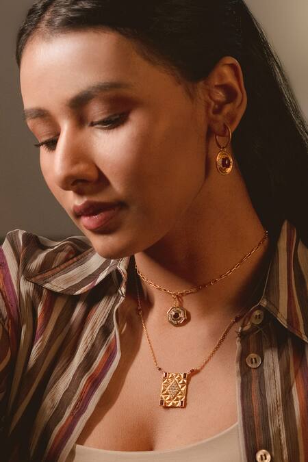 Ruuh Studios_Gold Plated Crystals, Diamonds Ripple Cubic Zirconia Embellished Charm Earrings _at_Aza_Fashions