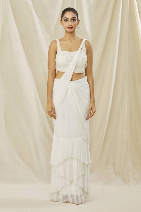 Arpan Vohra Ivory Georgette Pearls Square Neck Solid Pre Draped Saree With Tasselled Blouse at Aza Fashions Arpan Vohra_Ivory Georgette Pearls Square Neck Solid Pre Draped Saree With Tasselled Blouse _at_Aza_Fashions