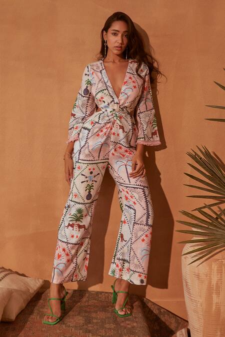 Buy NOIB White Linen, Lycra Embroidery V-neck Ella Lyocell Cutout Jumpsuit Online at Aza Fashions Buy_NOIB_White Linen, Lycra Embroidery V-neck Ella Lyocell Cutout Jumpsuit _Online_at_Aza_Fashions