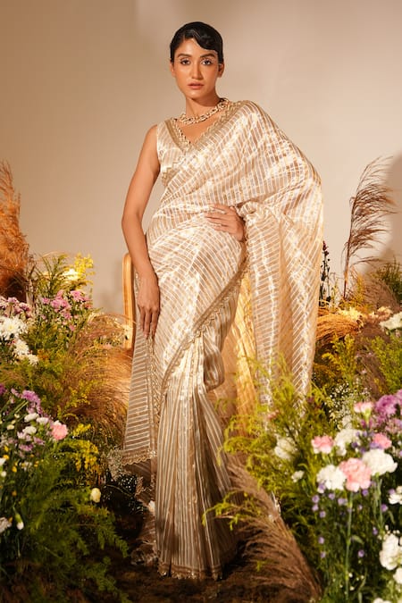 Shop Midushi Bajoria Gold Tissue Cut Work, Embroidery V-neck Striped Saree With Blouse at Aza Fashions Shop_Midushi Bajoria_Gold Tissue Cut Work, Embroidery V-neck Striped Saree With Blouse _at_Aza_Fashions