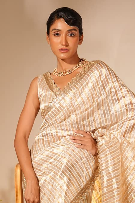 Midushi Bajoria Gold Tissue Cut Work, Embroidery V-neck Striped Saree With Blouse Online at Aza Fashions Midushi Bajoria_Gold Tissue Cut Work, Embroidery V-neck Striped Saree With Blouse _Online_at_Aza_Fashions