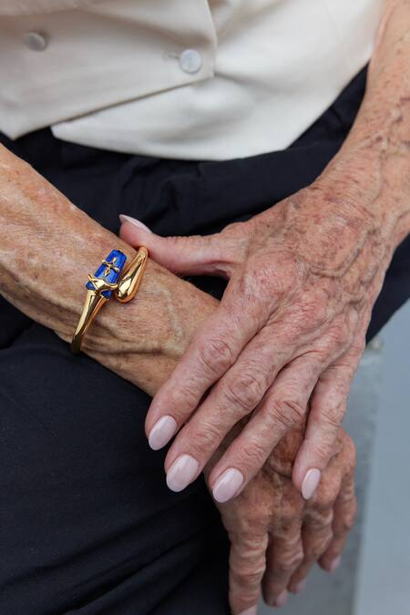 Shop Outhouse Gold Plated Stones The Lazuli Sculpt Handcuff Online at Aza Fashions Shop_Outhouse_Gold Plated Stones The Lazuli Sculpt Handcuff _Online_at_Aza_Fashions