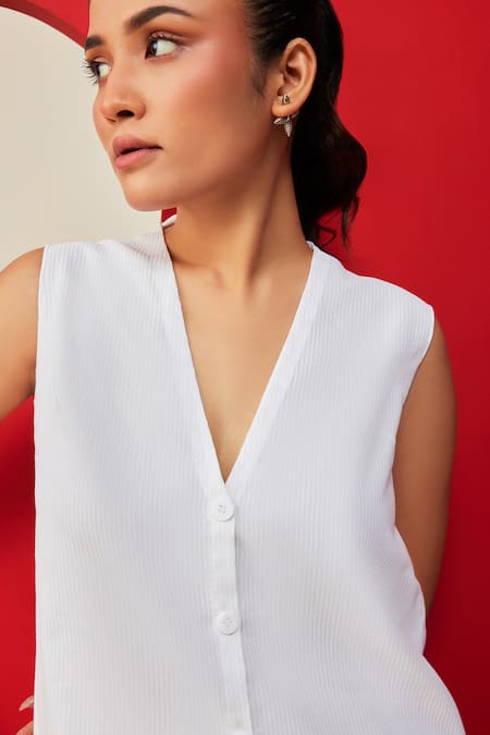 Shop Couché By Anandini White Vest 80% Cotton Stripe V Neck Pattern And Skort Set at Aza Fashions Shop_Couché By Anandini_White Vest 80% Cotton Stripe V Neck Pattern And Skort Set _at_Aza_Fashions