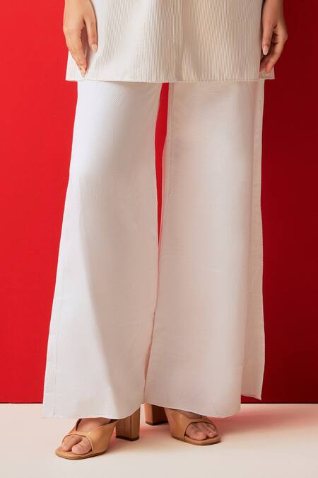 Couché By Anandini White Shirt 80% Cotton Pinstripe Collar And Flared Trouser Set Online at Aza Fashions Couché By Anandini_White Shirt 80% Cotton Pinstripe Collar And Flared Trouser Set _Online_at_Aza_Fashions