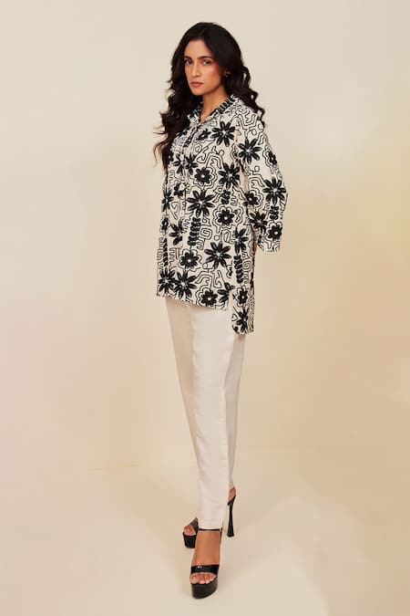 Shop Couché By Anandini Black Shirt 70% Viscose Printed Abstract Floral Notched And Flared Trouser Set at Aza Fashions Shop_Couché By Anandini_Black Shirt 70% Viscose Printed Abstract Floral Notched And Flared Trouser Set _at_Aza_Fashions