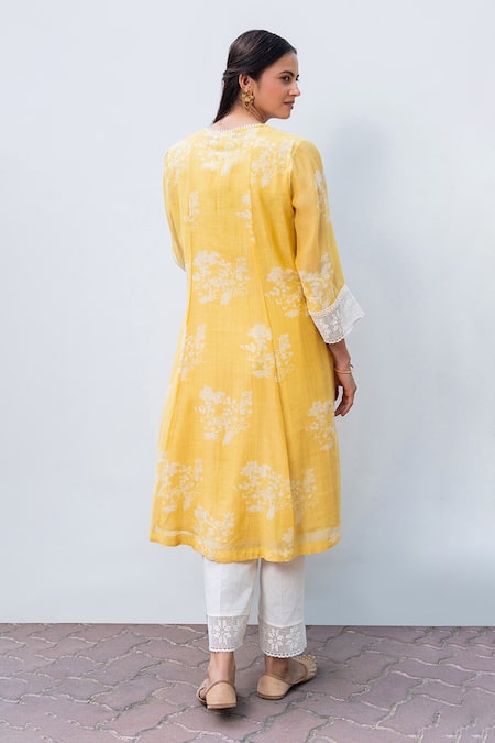 Shop OMI Yellow Chanderi, Cotton Lace Split V-neck Floral Print Work Yoke Kurta Pant Set at Aza Fashions Shop_OMI_Yellow Chanderi, Cotton Lace Split V-neck Floral Print Work Yoke Kurta Pant Set _at_Aza_Fashions