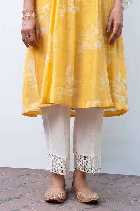 Shop OMI Yellow Chanderi, Cotton Lace Split V-neck Floral Print Work Yoke Kurta Pant Set Online at Aza Fashions Shop_OMI_Yellow Chanderi, Cotton Lace Split V-neck Floral Print Work Yoke Kurta Pant Set _Online_at_Aza_Fashions