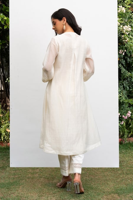 Shop OMI Off White Chanderi, Cotton Satin Embroidery, Lace Round Floral Kurta Pant Set at Aza Fashions Shop_OMI_Off White Chanderi, Cotton Satin Embroidery, Lace Round Floral Kurta Pant Set _at_Aza_Fashions