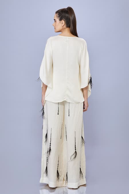 Shop_Dilnaz_Cream Blended Satin Linen Embroidered Sequin Contrast Flared Trouser_at_Aza_Fashions