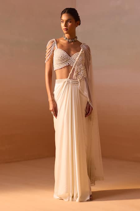 Buy Nitika Gujral Ivory Satin, Net Pearls Rosette Embroidered Pre-draped Saree With Bustier Online at Aza Fashions Buy_Nitika Gujral_Ivory Satin, Net Pearls Rosette Embroidered Pre-draped Saree With Bustier _Online_at_Aza_Fashions