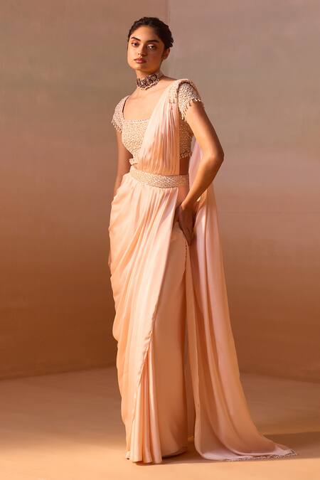 Buy_Nitika Gujral_Peach Satin, Net Embroidery, Pearl Embellished Pre-draped Saree With Blouse _Online_at_Aza_Fashions