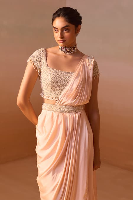 Shop_Nitika Gujral_Peach Satin, Net Embroidery, Pearl Embellished Pre-draped Saree With Blouse _Online_at_Aza_Fashions