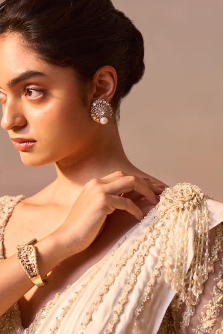 Buy Nitika Gujral Ivory Satin, Net Pearls, Dori Tassel Embellished Pre-draped Saree With Blouse Online at Aza Fashions Buy_Nitika Gujral_Ivory Satin, Net Pearls, Dori Tassel Embellished Pre-draped Saree With Blouse _Online_at_Aza_Fashions