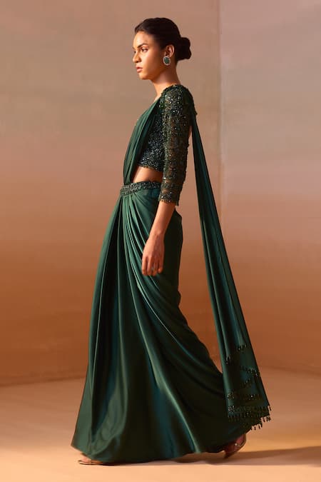 Shop Nitika Gujral Green Satin, Net Beads, Smocking Tassel Embellished Pre-draped Saree With Blouse Online at Aza Fashions Shop_Nitika Gujral_Green Satin, Net Beads, Smocking Tassel Embellished Pre-draped Saree With Blouse _Online_at_Aza_Fashions