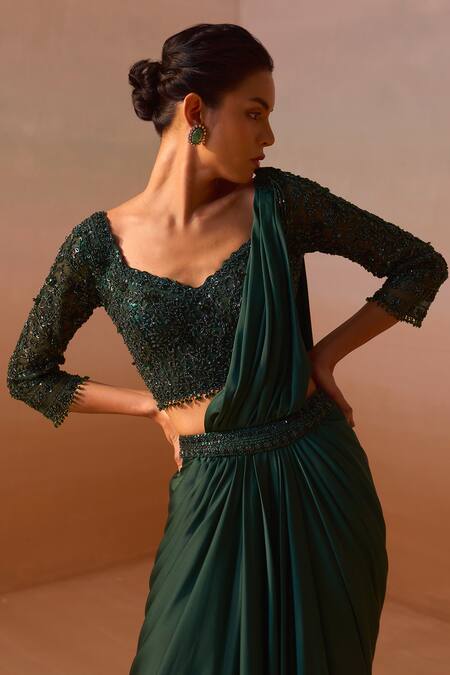 Nitika Gujral Green Satin, Net Beads, Smocking Tassel Embellished Pre-draped Saree With Blouse at Aza Fashions Nitika Gujral_Green Satin, Net Beads, Smocking Tassel Embellished Pre-draped Saree With Blouse _at_Aza_Fashions