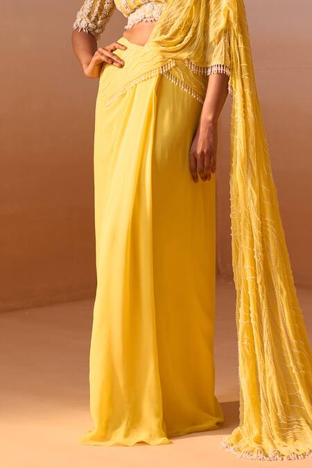 Nitika Gujral_Yellow Georgette, Net Pearls, Beads Ray Embellished Pre-draped Saree With Blouse _Online_at_Aza_Fashions