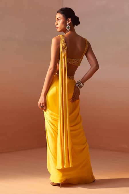 Nitika Gujral Yellow Satin, Net Ambrosia Border Embroidered Pre-draped Saree With Bustier Online at Aza Fashions Nitika Gujral_Yellow Satin, Net Ambrosia Border Embroidered Pre-draped Saree With Bustier _Online_at_Aza_Fashions