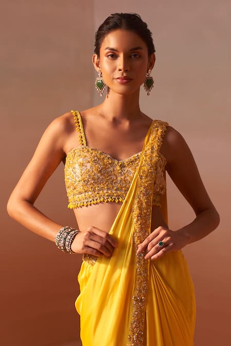 Nitika Gujral Yellow Satin, Net Ambrosia Border Embroidered Pre-draped Saree With Bustier at Aza Fashions Nitika Gujral_Yellow Satin, Net Ambrosia Border Embroidered Pre-draped Saree With Bustier _at_Aza_Fashions