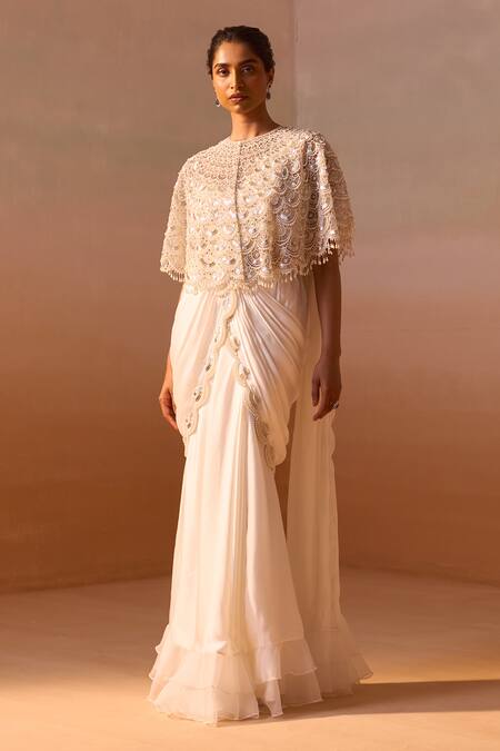 Nitika Gujral White Satin, Organza, Scallop Nalki Zircon Embroidered Cape Pre-draped Saree Set Online at Aza Fashions Nitika Gujral_White Satin, Organza, Scallop Nalki Zircon Embroidered Cape Pre-draped Saree Set _Online_at_Aza_Fashions