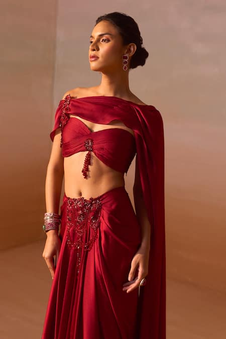 Nitika Gujral Maroon Organza, Satin Floret Tassel Embellished Tube Bustier With Draped Skirt at Aza Fashions Nitika Gujral_Maroon Organza, Satin Floret Tassel Embellished Tube Bustier With Draped Skirt _at_Aza_Fashions