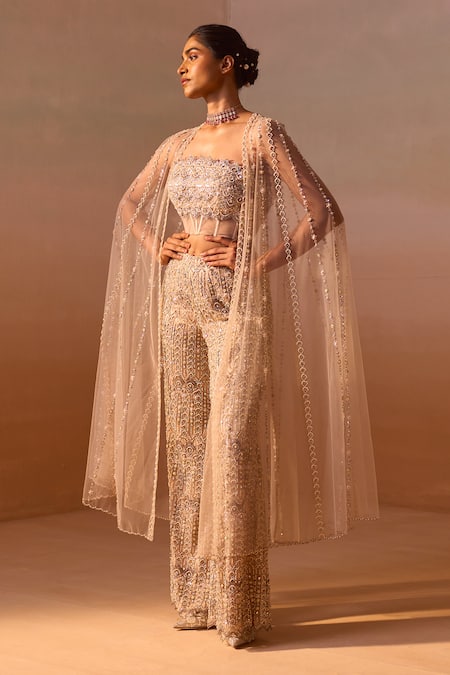 Buy_Nitika Gujral_Peach Net, Satin Crystals, Pearls, And Embroidered Corset Flared Trouser Set _Online_at_Aza_Fashions