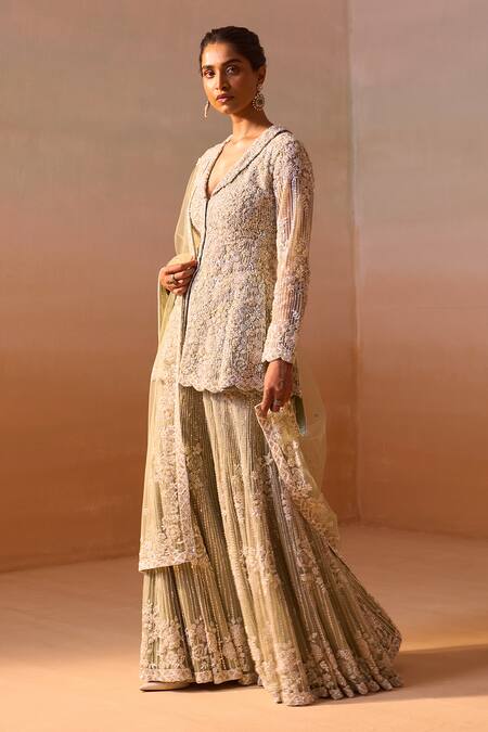 Shop Nitika Gujral Green Net Sequins, Beads, Pearls, Embroidery, Floral Peplum Jacket Sharara Set Online at Aza Fashions Shop_Nitika Gujral_Green Net Sequins, Beads, Pearls, Embroidery, Floral Peplum Jacket Sharara Set _Online_at_Aza_Fashions