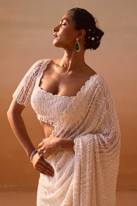 Shop_Nitika Gujral_Ivory Georgette, Satin Pearls, Sequins Cutwork Embroidered Saree With Blouse _Online_at_Aza_Fashions