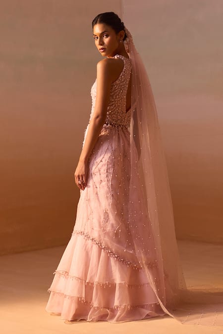 Nitika Gujral_Pink Organza, Net Pearls, Crystals, Sequins, Layered Embroidered Skirt Set _Online_at_Aza_Fashions