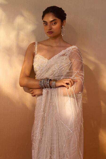Nitika Gujral_White Net, Satin Sequins, Stones Sweetheart Swarovski Work Saree With Blouse _at_Aza_Fashions
