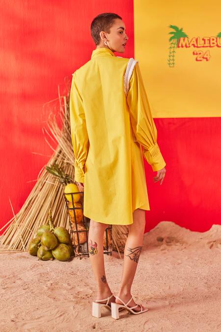 Shop Pooja Shroff Yellow Cotton Embroidery Collared Malibu Pleated Wave Embellished Shirt Dress at Aza Fashions Shop_Pooja Shroff_Yellow Cotton Embroidery Collared Malibu Pleated Wave Embellished Shirt Dress_at_Aza_Fashions