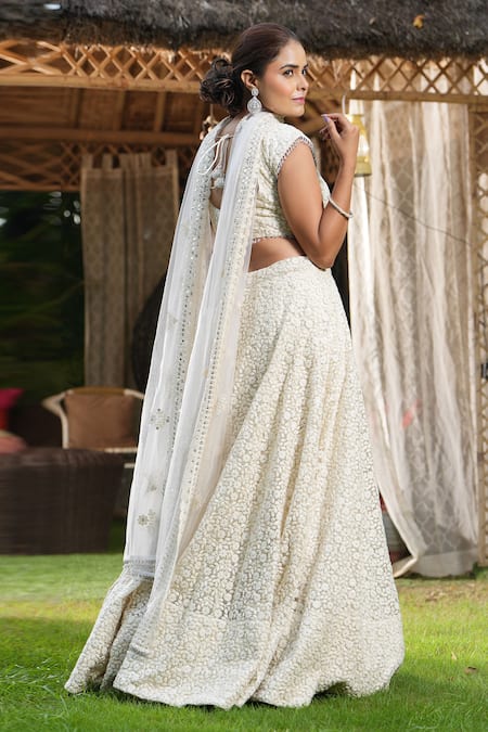 Studio Twelve 11_Ivory Net, Linen Sequins, Embroidery Sweetheart Neck Floral Lehenga Set _Online_at_Aza_Fashions