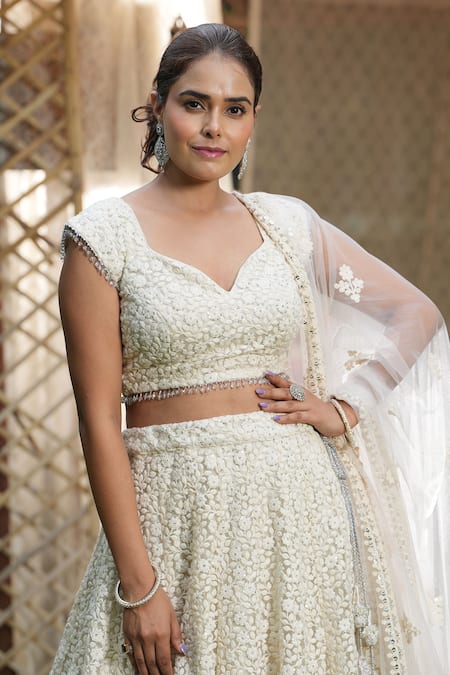 Shop_Studio Twelve 11_Ivory Net, Linen Sequins, Embroidery Sweetheart Neck Floral Lehenga Set _Online_at_Aza_Fashions
