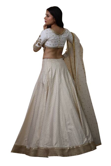 Buy Studio Twelve 11 Ivory Chanderi, Brocade, Net Embroidery, Sequins Woven Floral Lehenga Set Online at Aza Fashions Buy_Studio Twelve 11_Ivory Chanderi, Brocade, Net Embroidery, Sequins Woven Floral Lehenga Set _Online_at_Aza_Fashions