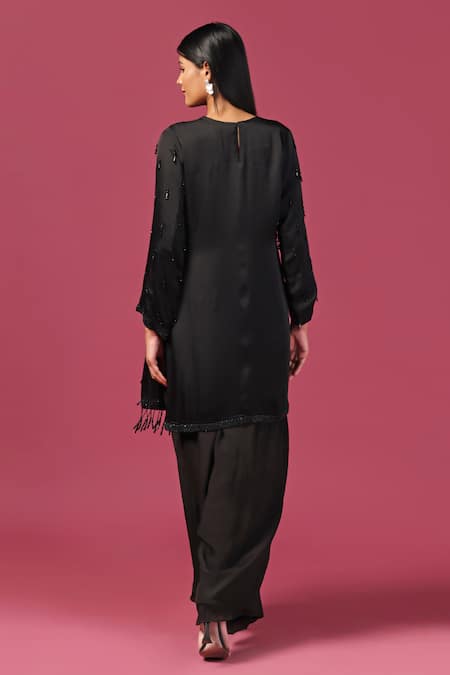 Shop Two Sisters By Gyans Black Georgette Cut Work, Tassels Round Neck Embellished Kurta And Palazzo Set at Aza Fashions Shop_Two Sisters By Gyans_Black Georgette Cut Work, Tassels Round Neck Embellished Kurta And Palazzo Set _at_Aza_Fashions