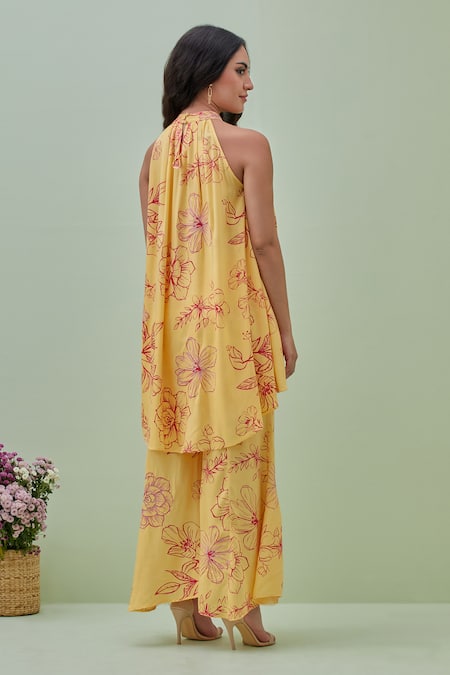 Shop Grass & Sunshine Yellow Viscose Embroidery Halter Neck Blossom Floral Print Kurta And Pant Set at Aza Fashions Shop_Grass & Sunshine_Yellow Viscose Embroidery Halter Neck Blossom Floral Print Kurta And Pant Set _at_Aza_Fashions