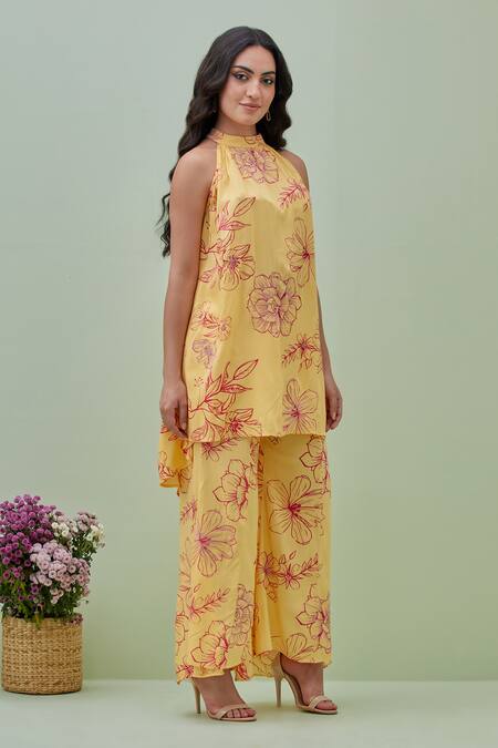 Grass & Sunshine Yellow Viscose Embroidery Halter Neck Blossom Floral Print Kurta And Pant Set at Aza Fashions Grass & Sunshine_Yellow Viscose Embroidery Halter Neck Blossom Floral Print Kurta And Pant Set _at_Aza_Fashions