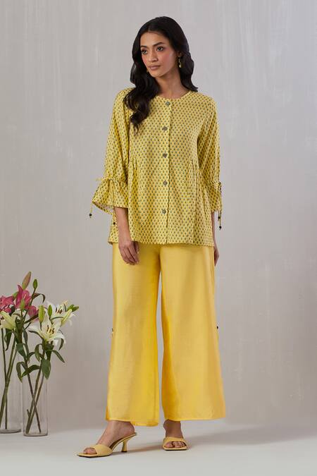 Grass & Sunshine Yellow Viscose Round Neck Flora Spectrum Print Top And Flared Pant Set Online at Aza Fashions Grass & Sunshine_Yellow Viscose Round Neck Flora Spectrum Print Top And Flared Pant Set _Online_at_Aza_Fashions