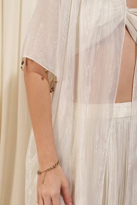 Rirasa Ivory Georgette, Lurex One Shoulder Jasmine Shimmer Textured Cape Skirt Set at Aza Fashions Rirasa_Ivory Georgette, Lurex One Shoulder Jasmine Shimmer Textured Cape Skirt Set _at_Aza_Fashions