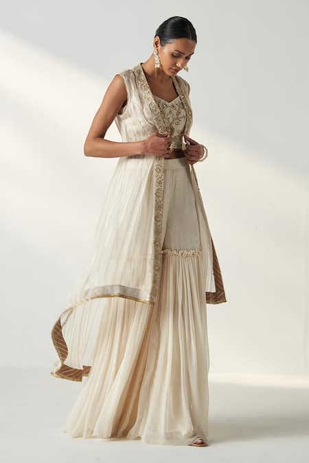 Studio Bagechaa Ivory Organza, Georgette Sequins, Embroidery High Low Cape Gharara Set Online at Aza Fashions Studio Bagechaa_Ivory Organza, Georgette Sequins, Embroidery High Low Cape Gharara Set _Online_at_Aza_Fashions